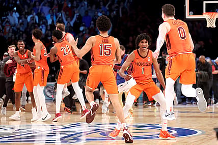 Mar 12, 2022; Brooklyn, NY, USA; Virginia Tech Hokies forward David N'Guessan (1) celebrates with center Lynn Kidd (15) and guard Hunter Cattoor (0) after defeating the Duke Blue Devils 82-67 in the ACC Men's Basketball Tournament final at Barclays Center. Mandatory Credit: Brad Penner-USA TODAY Sports