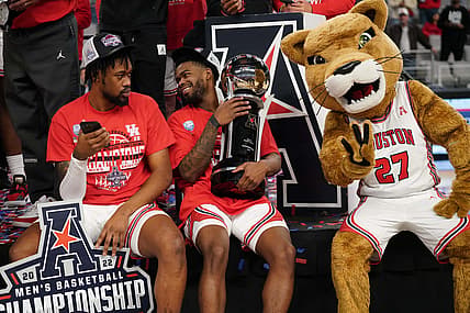 Mar 13, 2022; Fort Worth, TX, USA; The Houston Cougars celebrate punching their ticket to the NCAA Tournament after defeating the Memphis Tigers in the American Conference Tournament Championship at Dickies Arena.  Mandatory Credit: Chris Jones-USA TODAY Sports