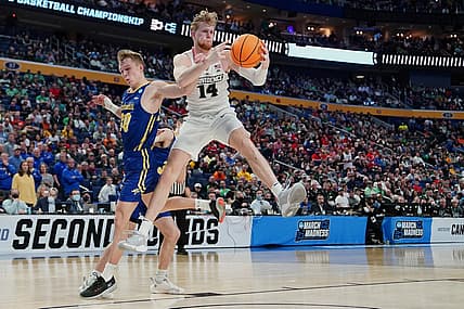 Mar 17, 2022; Buffalo, NY, USA; Providence Friars forward Noah Horchler (14) grabs a rebound against South Dakota State Jackrabbits guard Charlie Easley (30) in the second half during the first round of the 2022 NCAA Tournament at KeyBank Center. Mandatory Credit: Gregory Fisher-USA TODAY Sports