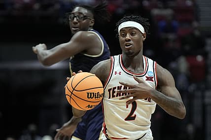 Mar 18, 2022; San Diego, CA, USA; Texas Tech Red Raiders guard Davion Warren (2) controls the ball against the Montana State Bobcats in the first half during the first round of the 2022 NCAA Tournament at Viejas Arena. Mandatory Credit: Kirby Lee-USA TODAY Sports