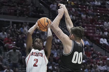 Mar 18, 2022; San Diego, CA, USA; Arizona Wildcats guard Adama Bal (2) shoots the basketball against Wright State Raiders forward Grant Basile (00) during the first half during the first round of the 2022 NCAA Tournament at Viejas Arena. Mandatory Credit: Kirby Lee-USA TODAY Sports