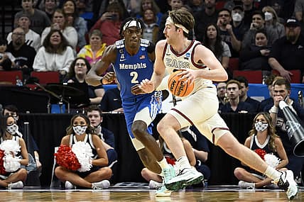 Mar 19, 2022; Portland, OR, USA; Gonzaga Bulldogs forward Drew Timme (2) drives to the basket while Memphis Tigers center Jalen Duren (2) defends during the second half in the second round of the 2022 NCAA Tournament at Moda Center. Mandatory Credit: Troy Wayrynen-USA TODAY Sports