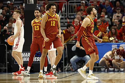 Mar 20, 2022; Milwaukee, WI, USA; Iowa State Cyclones guard Gabe Kalscheur (22) and Iowa State Cyclones forward Robert Jones (12) react to a play during the second half against Wisconsin Badgers in the second round of the 2022 NCAA Tournament at Fiserv Forum. Mandatory Credit: Jeff Hanisch-USA TODAY Sports