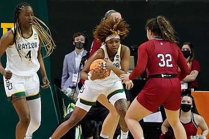Mar 20, 2022; Waco, Texas, USA;  Baylor Lady Bears forward NaLyssa Smith (1) grabs a rebound against South Dakota Coyotes guard Kyah Watson (32) during the second half at Ferrell Center. Mandatory Credit: Chris Jones-USA TODAY Sports