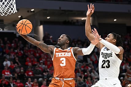 Mar 20, 2022; Milwaukee, WI, USA; Texas Longhorns guard Courtney Ramey (3) shoots the ball during the first half against Purdue Boilermakers guard Jaden Ivey (23) in the second round of the 2022 NCAA Tournament at Fiserv Forum. Mandatory Credit: Benny Sieu-USA TODAY Sports