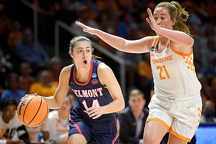 Belmont guard Jamilyn Kinney (14) dribbles the ball as Tennessee guard/forward Tess Darby (21) defends during a second round NCAA Division I Women's Basketball Championship game between No. 4 Tennessee and No. 12 Belmont at Thompson-Boling Arena in Knoxville, Tenn. on Monday, March 21, 2022.

Kns Ncaa Lady Vols Belmont RANK 7