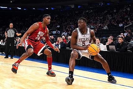 Mar 29, 2022; New York, New York, USA; Texas A&M Aggies guard Hassan Diarra (5) looks to make a move against Washington State Cougars guard Noah Williams (24) during the first half of the NIT college basketball semifinals at Madison Square Garden. Mandatory Credit: Gregory Fisher-USA TODAY Sports
