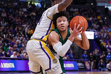 Dec 1, 2021; Baton Rouge, Louisiana, USA;  Ohio Bobcats guard Mark Sears (1) drives to the basket against LSU Tigers forward Darius Days (4) during the second half at Pete Maravich Assembly Center. Mandatory Credit: Stephen Lew-USA TODAY Sports