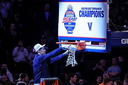 Mar 12, 2022; New York, NY, USA; Villanova Wildcats head coach Jay Wright cuts down the net after defeating Creighton Bluejays in the 2022 Big East Conference Tournament championship game at Madison Square Garden. Mandatory Credit: Vincent Carchietta-USA TODAY Sports