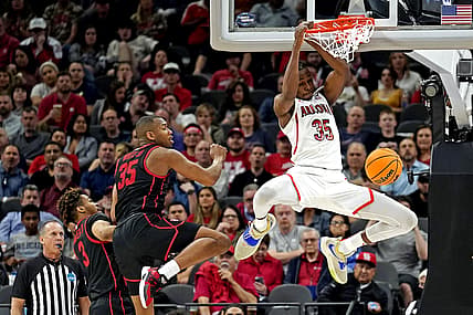 Mar 24, 2022; San Antonio, TX, USA; Arizona Wildcats center Christian Koloko (35) dunk the ball again Houston Cougars forward Fabian White Jr. (35) during the second half in the semifinals of the South regional of the men's college basketball NCAA Tournament at AT&T Center. Mandatory Credit: Scott Wachter-USA TODAY Sports
