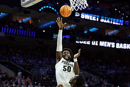Mar 25, 2022; Philadelphia, PA, USA; Purdue Boilermakers forward Trevion Williams (50) shoots against St. Peter's Peacocks forward KC Ndefo (11) in the first half in the semifinals of the East regional of the men's college basketball NCAA Tournament at Wells Fargo Center. Mandatory Credit: Bill Streicher-USA TODAY Sports