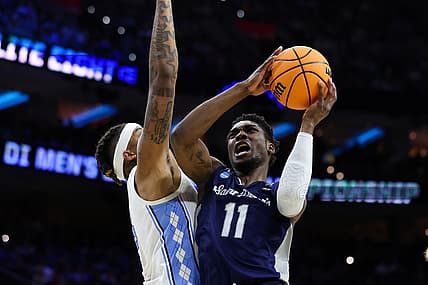 Mar 27, 2022; Philadelphia, PA, USA; St. Peters Peacocks forward KC Ndefo (11) shoots against the North Carolina Tar Heels during the second half in the finals of the East regional of the men's college basketball NCAA Tournament at Wells Fargo Center. Mandatory Credit: Bill Streicher-USA TODAY Sports