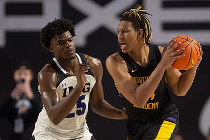 Montverde Academy's Malik Reneau (14) looks for an opening against IMG Academy's Jarace Walker (25) during the second half of the GEICO Nationals semifinal between Montverde Academy and IMG Academy, Friday, April 1, 2022, at Suncoast Credit Union Arena in Fort Myers, Fla.Montverde Academy defeated IMG Academy 62-57.

GEICO Nationals 2022: Montverde Academy (Fla.) vs. IMG Academy (Fla.) semifinal, April 1, 2022