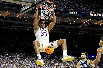 Apr 2, 2022; New Orleans, LA, USA; Kansas Jayhawks forward David McCormack (33) dunks the ball against dunks the ball against Villanova Wildcats forward Brandon Slater (3) during the second half in the 2022 NCAA men's basketball tournament Final Four semifinals at Caesars Superdome. Mandatory Credit: Robert Deutsch-USA TODAY Sports