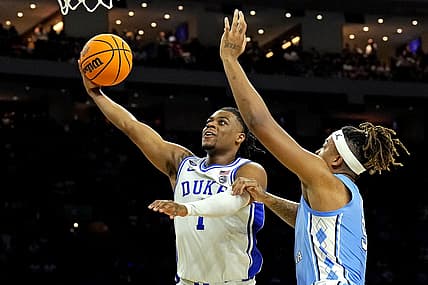 Apr 2, 2022; New Orleans, LA, USA; Duke Blue Devils guard Trevor Keels (1) shoots the ball againstNorth Carolina Tar Heels forward Armando Bacot (5) in the 2022 NCAA men's basketball tournament Final Four semifinals at Caesars Superdome. Mandatory Credit: Robert Deutsch-USA TODAY Sports