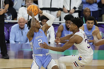 Apr 4, 2022; New Orleans, LA, USA; North Carolina Tar Heels guard Caleb Love (2) shoots the ball against Kansas Jayhawks guard Ochai Agbaji (30) during the 2022 NCAA men's basketball tournament Final Four championship game at Caesars Superdome. Mandatory Credit: Stephen Lew-USA TODAY Sports