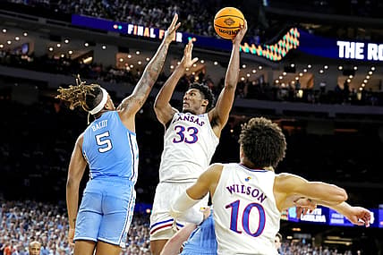 Apr 4, 2022; New Orleans, LA, USA; Kansas Jayhawks forward David McCormack (33) shoots the ball against North Carolina Tar Heels forward Armando Bacot (5) during the 2022 NCAA men's basketball tournament Final Four championship game at Caesars Superdome. Mandatory Credit: Robert Deutsch-USA TODAY Sports