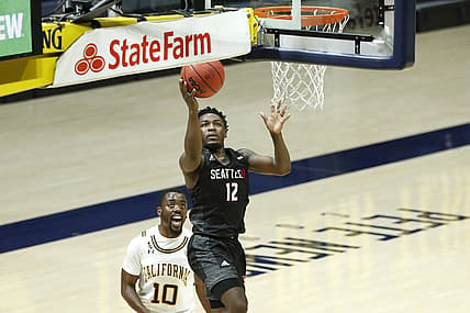 Dec 22, 2020; Berkeley, California, USA;  Seattle Redhawks guard Darrion Trammell (12) scores past California Golden Bears guard Makale Foreman (10) during the first half at Haas Pavilion. Mandatory Credit: Darren Yamashita-USA TODAY Sports