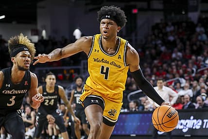 Feb 17, 2022; Cincinnati, Ohio, USA; Wichita State Shockers guard Ricky Council IV (4) dribbles against Cincinnati Bearcats guard Mike Saunders Jr. (3) in the second half at Fifth Third Arena. Mandatory Credit: Katie Stratman-USA TODAY Sports