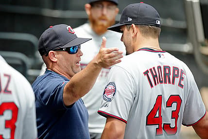 Jun 30, 2019; Chicago, IL, USA; Minnesota Twins starting pitcher Lewis Thorpe (43) talks with pitching coach Wes Johnson (47) in the dugout after pitching against the Chicago White Sox during the first inning in his MLB debut at Guaranteed Rate Field. Mandatory Credit: Jon Durr-USA TODAY Sports