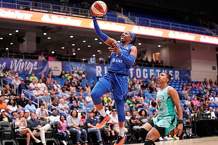 Dallas Wings guard Arike Ogunbowale goes in for a layup.