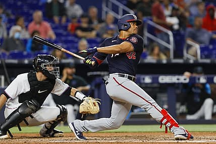 Jun 9, 2022; Miami, Florida, USA; Washington Nationals right fielder Juan Soto (22) hits a two-run RBI single during the fifth inning against the Miami Marlins at loanDepot Park. Mandatory Credit: Sam Navarro-USA TODAY Sports
