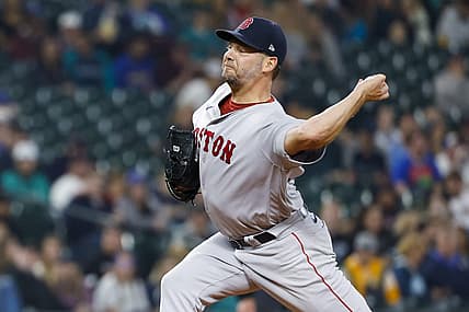 Jun 10, 2022; Seattle, Washington, USA; Boston Red Sox starting pitcher Rich Hill (44) throws against the Seattle Mariners during the second inning at T-Mobile Park. Mandatory Credit: Joe Nicholson-USA TODAY Sports