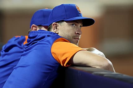 Jun 14, 2022; New York City, New York, USA; New York Mets injured pitcher Jacob deGrom looks out of the dugout during the eighth inning against the Milwaukee Brewers at Citi Field. Mandatory Credit: Brad Penner-USA TODAY Sports