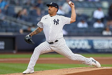 Jun 15, 2022; Bronx, New York, USA; New York Yankees starting pitcher Nestor Cortes (65) delivers a pitch during the first inning against the Tampa Bay Rays at Yankee Stadium. Mandatory Credit: Vincent Carchietta-USA TODAY Sports