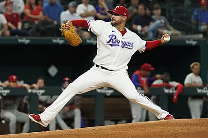 Jun 21, 2022; Arlington, Texas, USA; Texas Rangers starting pitcher Martin Perez (54) throws to the plate during the first inning against the Philadelphia Phillies at Globe Life Field. Mandatory Credit: Raymond Carlin III-USA TODAY Sports