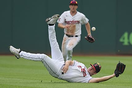 Jun 26, 2022; Cleveland, Ohio, USA; Cleveland Guardians left fielder Ernie Clement (28) dives for an RBI single hit by Boston Red Sox second baseman Trevor Story (not pictured) during the sixth inning at Progressive Field. Mandatory Credit: Ken Blaze-USA TODAY Sports