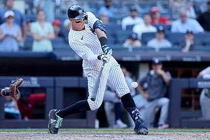 Jun 26, 2022; Bronx, New York, USA; New York Yankees center fielder Aaron Judge (99) hits a game winning walk off three run home run against the Houston Astros during the tenth inning at Yankee Stadium. Mandatory Credit: Brad Penner-USA TODAY Sports