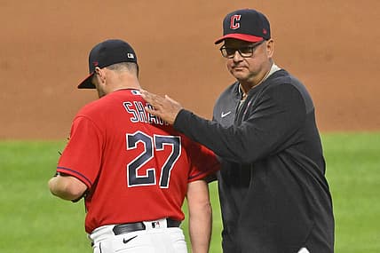 Jun 27, 2022; Cleveland, Ohio, USA; Cleveland Guardians relief pitcher Bryan Shaw (27) walks of the mound beside manager Terry Francona (77) during a pitching change in the seventh inning against the Minnesota Twins at Progressive Field. Mandatory Credit: David Richard-USA TODAY Sports