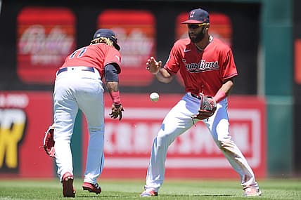 Jun 28, 2022; Cleveland, Ohio, USA; Cleveland Guardians third baseman Jose Ramirez (11) and shortstop Amed Rosario (1) can not make the catch of a single hit by Minnesota Twins second baseman Luis Arraez (not pictured) during the third inning at Progressive Field. Mandatory Credit: Ken Blaze-USA TODAY Sports