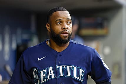 Jun 28, 2022; Seattle, Washington, USA; Seattle Mariners first baseman Carlos Santana (41) stands in the dugout during the third inning against the Baltimore Orioles at T-Mobile Park. Mandatory Credit: Joe Nicholson-USA TODAY Sports