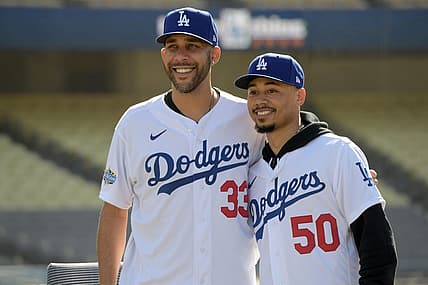 Feb 12, 2020; Los Angeles, California, USA;  Los Angeles Dodgers players David Price (33) and Mookie Betts (50) pose during a press conference at Dodger Stadium. Mandatory Credit: Kirby Lee-USA TODAY Sports