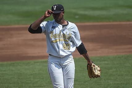 Jun 25, 2021; Omaha, Nebraska, USA; Vanderbilt Commodores starting pitcher Kumar Rocker (80) pitches in the second inning against the NC State Wolfpack at TD Ameritrade Park. Mandatory Credit: Steven Branscombe-USA TODAY Sports