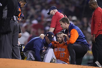 May 16, 2022; Boston, Massachusetts, USA; Houston Astros pitcher Jake Odorizzi (17) is helped onto a stretcher after suffering a leg injury during the fifth inning against the Boston Red Sox at Fenway Park. Mandatory Credit: Gregory Fisher-USA TODAY Sports