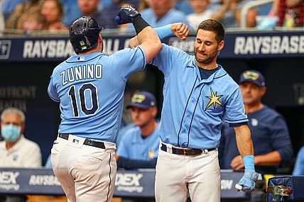 Jun 5, 2022; St. Petersburg, Florida, USA;  Tampa Bay Rays catcher Mike Zunino (10) is congratulated by center fielder Kevin Kiermaier (39) after hitting a two-run home run against the Chicago White Sox in the sixth inning at Tropicana Field. Mandatory Credit: Nathan Ray Seebeck-USA TODAY Sports