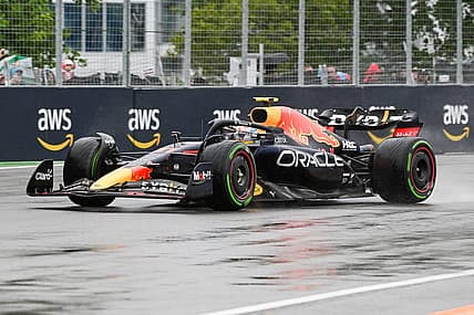 Jun 18, 2022; Montreal, Quebec, CAN; Red Bull Racing driver Sergio Perez of Mexico exits the fourteenth turn during the third free practice session at Circuit Gilles Villeneuve. Mandatory Credit: David Kirouac-USA TODAY Sports