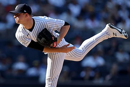 Jun 26, 2022; Bronx, New York, USA; New York Yankees starting pitcher Michael King (34) follows through on a pitch against the Houston Astros during the tenth inning at Yankee Stadium. Mandatory Credit: Brad Penner-USA TODAY Sports