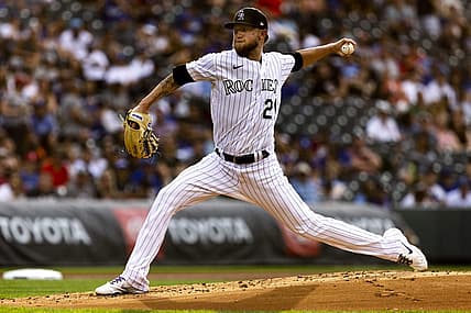 Jun 28, 2022; Denver, Colorado, USA; Colorado Rockies starting pitcher Kyle Freeland (21) pitches against the Los Angeles Dodgers during the first inning at Coors Field. Mandatory Credit: Michael Ciaglo-USA TODAY Sports