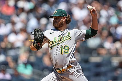 Jun 29, 2022; Bronx, New York, USA; Oakland Athletics starting pitcher Cole Irvin (19) delivers a pitch during the first inning against the New York Yankees at Yankee Stadium. Mandatory Credit: Vincent Carchietta-USA TODAY Sports