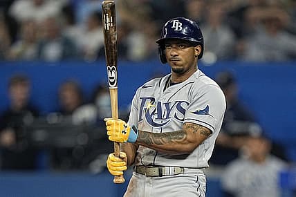 Jun 30, 2022; Toronto, Ontario, CAN; Tampa Bay Rays shortstop Wander Franco (5) looks at his bat during during the seventh inning against the Toronto Blue Jays at Rogers Centre. Mandatory Credit: John E. Sokolowski-USA TODAY Sports