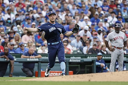 Jul 1, 2022; Chicago, Illinois, USA; Chicago Cubs starting pitcher Adrian Sampson (41) throws to first base for an out during the fifth inning of a baseball game against the Boston Red Sox at Wrigley Field. Mandatory Credit: Kamil Krzaczynski-USA TODAY Sports