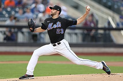 Jul 1, 2022; New York City, New York, USA; New York Mets starting pitcher David Peterson (23) delivers a pitch during the first inning against the Texas Rangers at Citi Field. Mandatory Credit: Vincent Carchietta-USA TODAY Sports