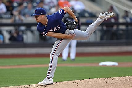 Jul 1, 2022; New York City, New York, USA;  Texas Rangers starting pitcher Glenn Otto (49) delivers a pitch during the first inning against the New York Mets at Citi Field. Mandatory Credit: Vincent Carchietta-USA TODAY Sports