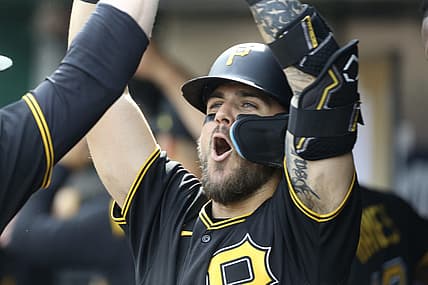 Jul 2, 2022; Pittsburgh, Pennsylvania, USA;  Pittsburgh Pirates first baseman Michael Chavis (2) celebrates his  two-run home run in the dugout against the Milwaukee Brewers during the third inning at PNC Park. Mandatory Credit: Charles LeClaire-USA TODAY Sports