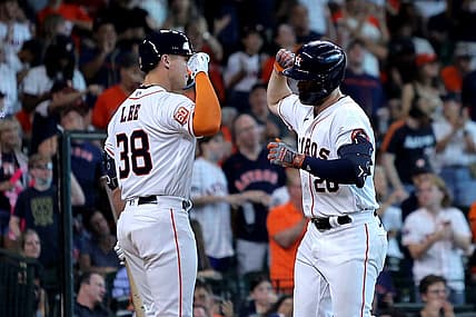 Jul 2, 2022; Houston, Texas, USA; Houston Astros left fielder Chas McCormick (20, right) is congratulated by Houston Astros catcher Korey Lee (38, left) after hitting a home run against the Los Angeles Angels during the seventh inning at Minute Maid Park. Mandatory Credit: Erik Williams-USA TODAY Sports