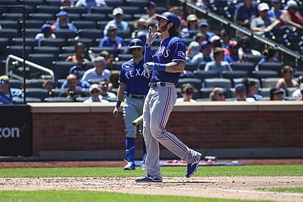 Jul 3, 2022; New York City, New York, USA; Texas Rangers catcher Jonah Heim (28) crosses home plate after hitting a solo home run in the third inning against the New York Mets at Citi Field. Mandatory Credit: Wendell Cruz-USA TODAY Sports